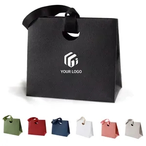 Multipurpose reusable ribbon handles paper gift wrap bag