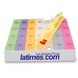 White Base With 7 Individual Pill Boxes In Rainbow Colors Medicine Tray Organizer