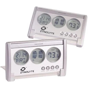 Compact Lcd Travel Alarm Clock With Silver Finish And A Clear Translucent Cover