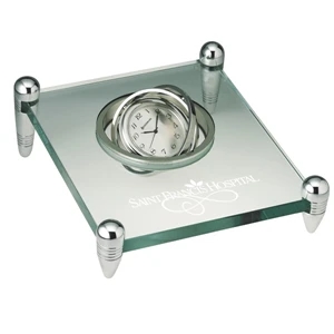 Transcendental - Spinning Desk Clock Suspended In Glass Stand With 4 Silver Posts. Closeout