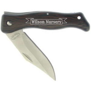 Woodsman (r) - Pocket Knife With Wood Grain Handle Measures 3 1/2" Closed
