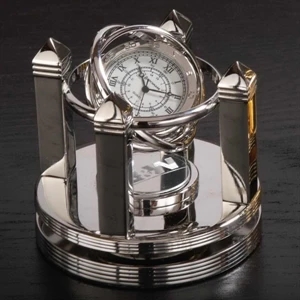 Celestial - Quartz Desk Clock That Is Surrounded By Rings That Whirl And Twirl