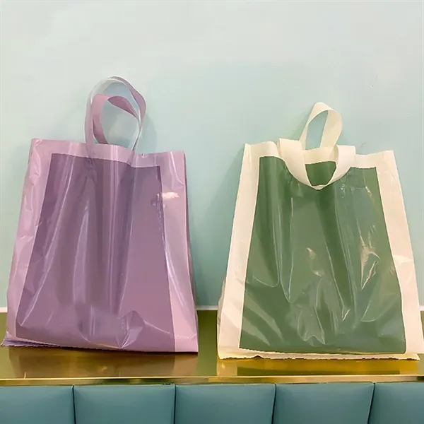 Plastic Shopping Bag Handle Retail Merchandise Groceries - Plastic Shopping Bag Handle Retail Merchandise Groceries - Image 1 of 1