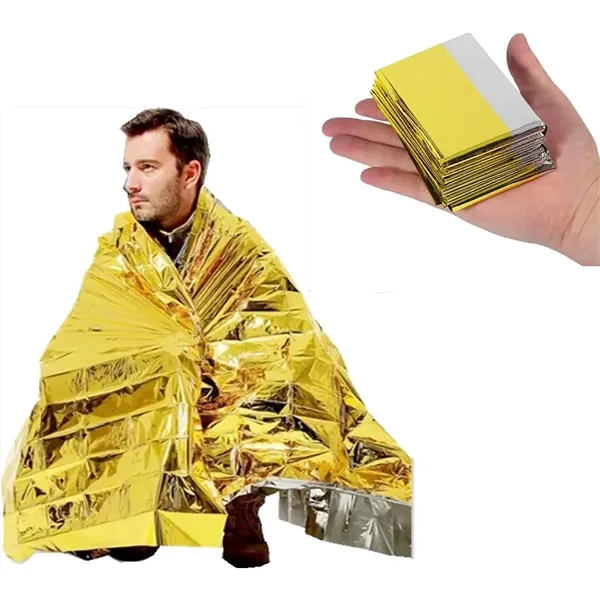 Silver and gold foil survival blanket outdoors - Silver and gold foil survival blanket outdoors - Image 8 of 9