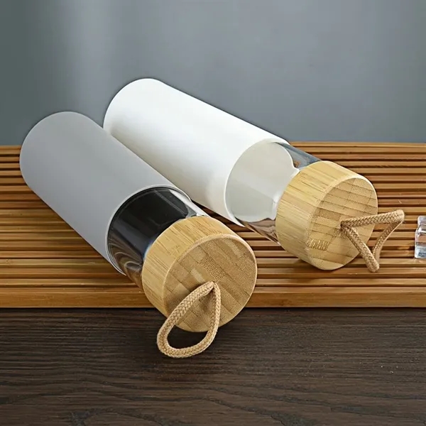 Glass Water Bottle With Bamboo Lid And Silicone Sleeve - Glass Water Bottle With Bamboo Lid And Silicone Sleeve - Image 1 of 3