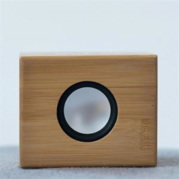 Bamboo Wireless Charger With Bluetooth Speaker - Bamboo Wireless Charger With Bluetooth Speaker - Image 1 of 2